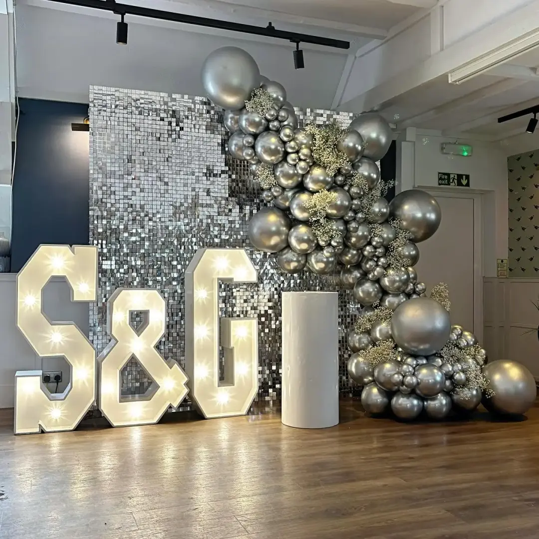 Silver sequin balloon feature wall backdrop