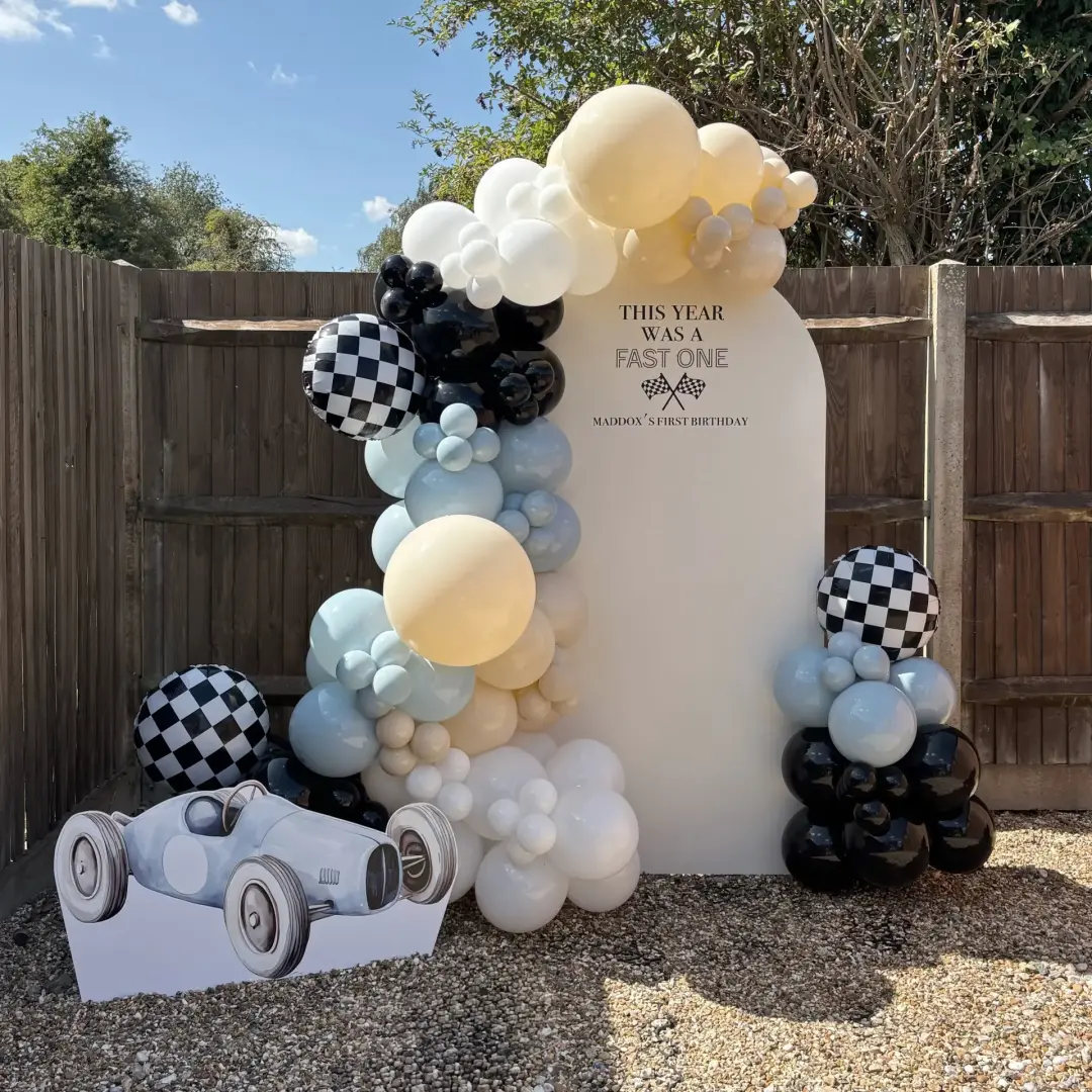 Racing-themed birthday balloon display background