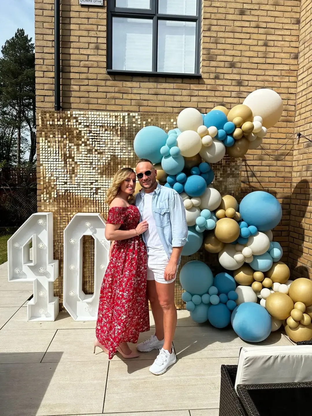 Blue, cream and gold birthday balloon display