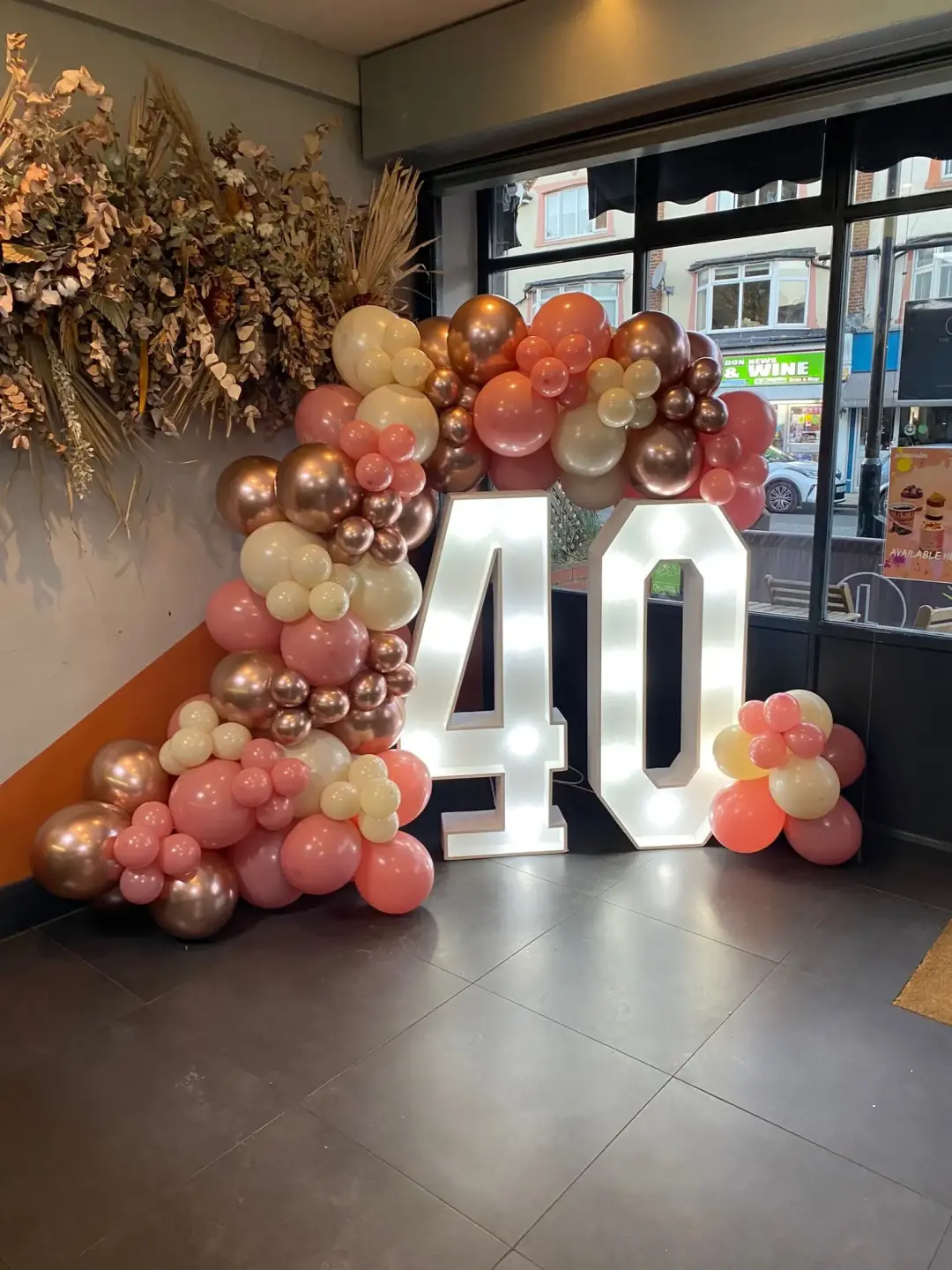 Pink and rose gold fortieth birthday balloons
