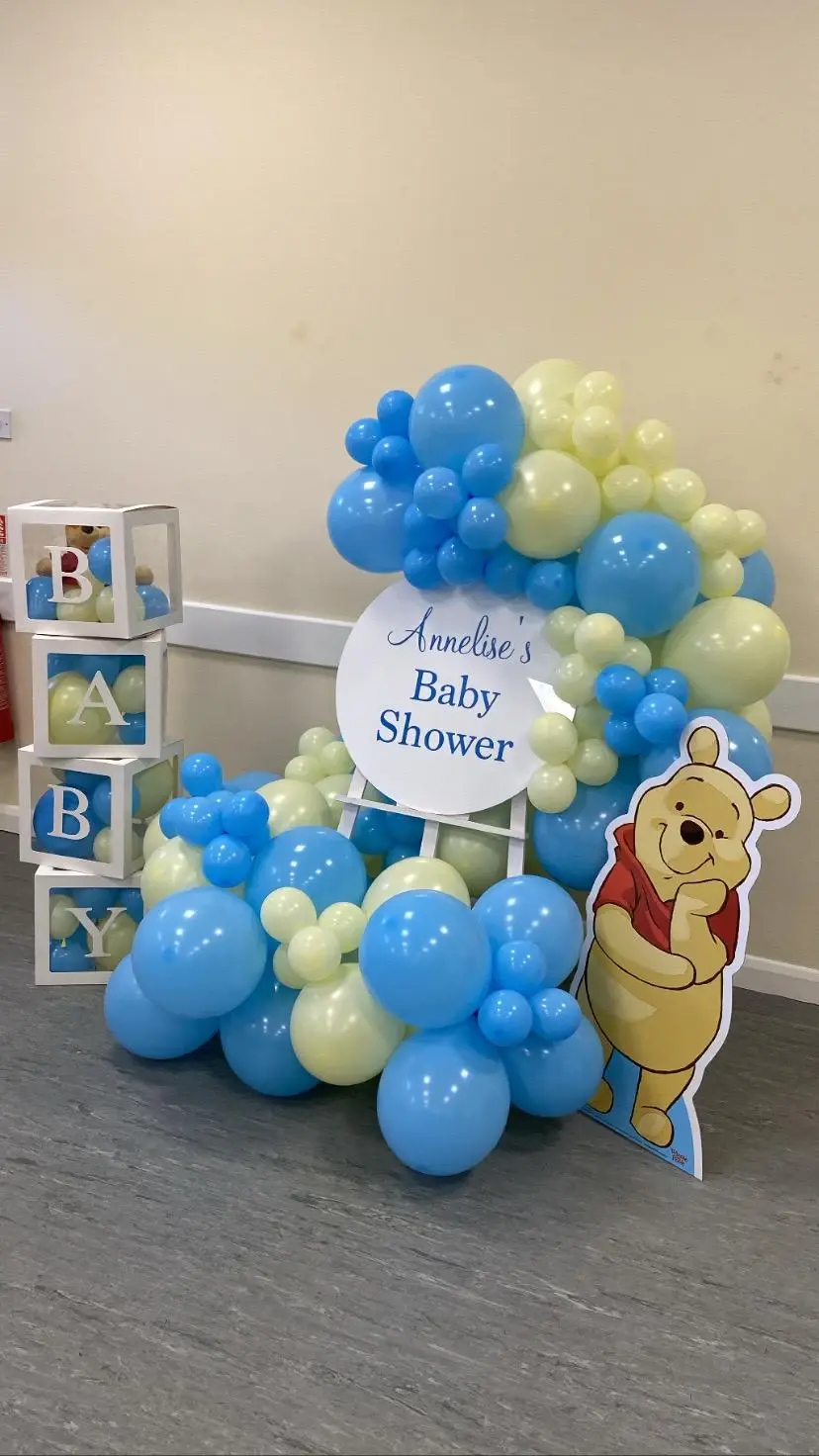 Blue and green Winnie the Pooh baby shower balloons
